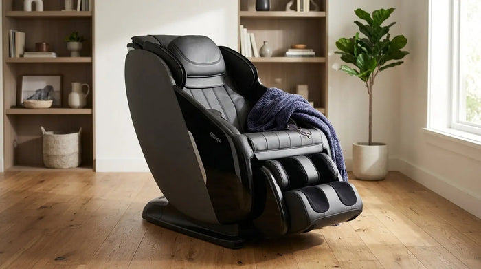 A OSIM massage chair in black leather in a modern room showing the premium look.