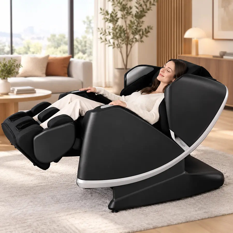 A woman reclines in a modern black massage chair with a silver trim accent in a bright, contemporary living room.